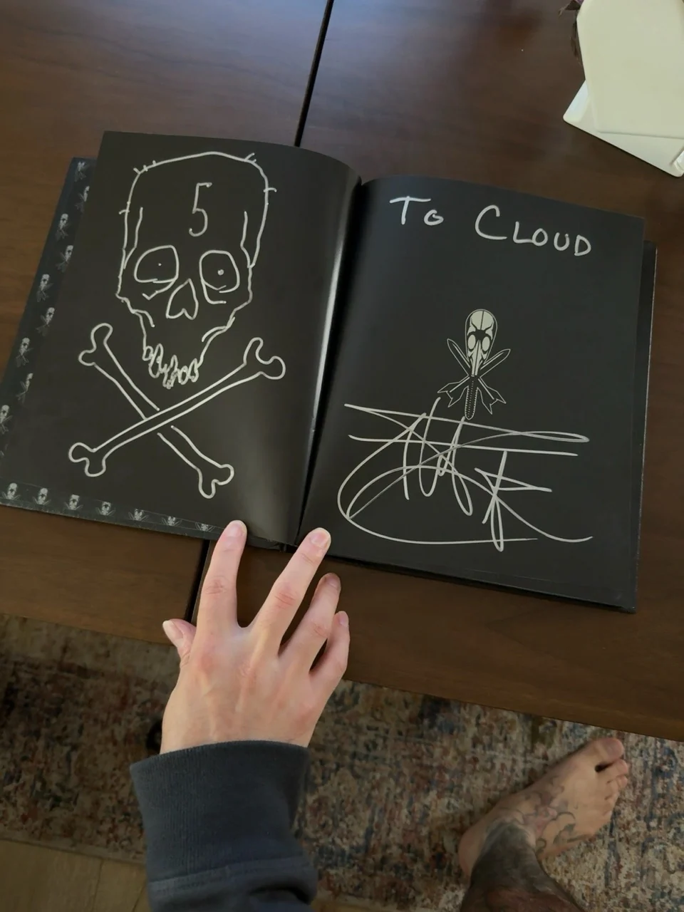 A skull drawing and Chet Zar inscription addressed to Cloud.